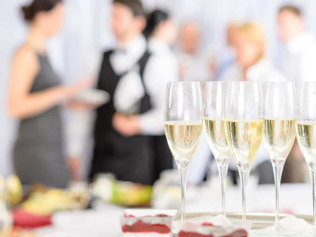 Champagne glasses at a dinner party